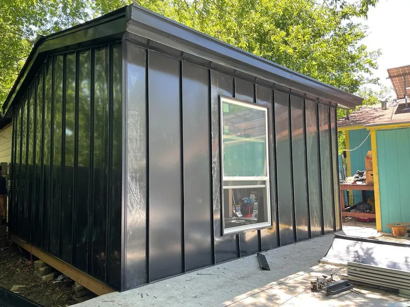 Black standing seam metal wall panels for Metal Roof Installation in Satellite Beach