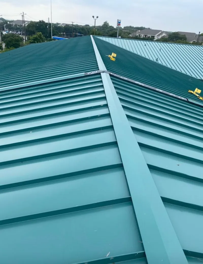 Green commercial metal roof ridge and valley for Metal Roof Repair in Satellite Beach